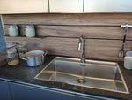 Cucina design con penisola "Kali" By Arredo3 in Noce Imperial e PET INOX