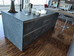 Cucina design con penisola "Kali" By Arredo3 in Noce Imperial e PET INOX
