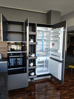 Cucina design con penisola "Kali" By Arredo3 in Noce Imperial e PET INOX